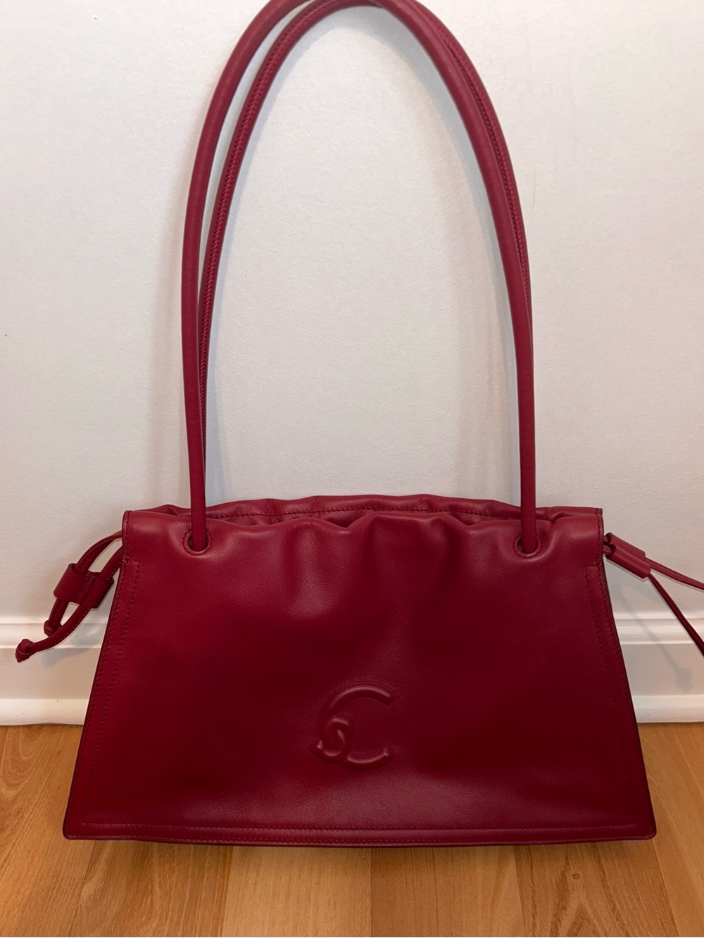 Coccinelle Dulse Medium Drawstring Shoulder Bag in Red Leather
